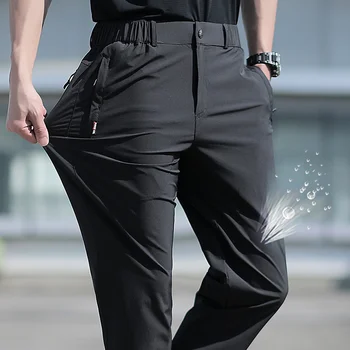 Мужские летние брюки большого размера, эластичные дышащие брюки с прямыми штанинами из ледяного шелка большого размера, черные брюки с быстросохнущей резинкой 6XL, быстросохнущие.